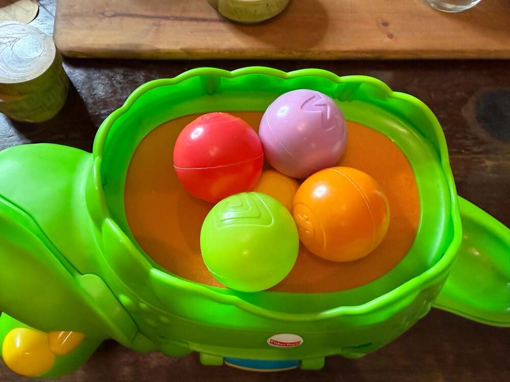 Fisher-Price Double Poppin' Dinosaur Toy with Balls
